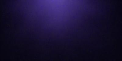 The primary subject of the image is a purple background. The setting is a dark, purple sky, which creates a moody atmosphere. The visual style is a photo, capturing the purple sky as the main focus. The colors and mood of the image are predominantly purple, giving it a calm and serene appearance.