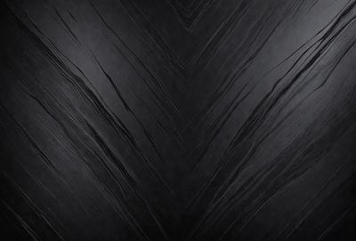 The primary subject of the image is a black and white patterned surface, which appears to be a wall or a piece of art. The setting is a dark room, and the visual style is a close-up of the pattern. The colors and mood of the image are predominantly dark and moody, with the black and white pattern creating a striking contrast against the dark background.
