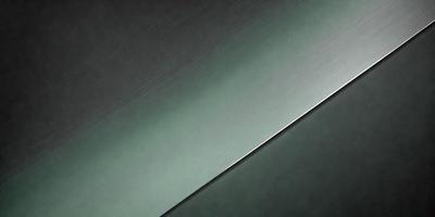 The primary subject of the image is a shiny metal surface, which appears to be a piece of metal or a metal sheet. The setting is a dark background, which contrasts with the shiny metal surface. The visual style of the image is a close-up of the metal surface, showcasing its reflective properties. The colors in the image are predominantly dark, with the shiny metal surface being the main focus and source of light. The overall atmosphere of the image is one of depth and contrast, with the metal surface