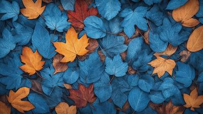 The primary subject of the image is a pile of leaves, predominantly orange and blue, scattered on the ground. The setting is an outdoor environment, possibly a forest or a park. The visual style is a close-up of the leaves, showcasing their vibrant colors and textures. The colors and mood of the image are warm and inviting, with the orange leaves adding a sense of warmth and the blue leaves providing a cool, calming effect.