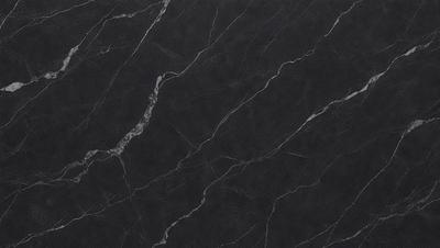 The primary subject of the image is a close-up of a marble countertop. The setting is a kitchen, with the marble countertop being the main focus of the scene. The visual style is a photo, showcasing the natural texture and patterns of the marble. The colors and mood of the image are predominantly black, giving it a sleek and modern appearance.