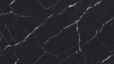 The primary subject of the image is a black marble countertop. The setting is a kitchen, with the countertop being the main focus of the scene. The visual style is a close-up of the marble countertop, showcasing its texture and pattern. The colors and mood of the image are predominantly dark, with the black marble countertop being the main source of contrast.