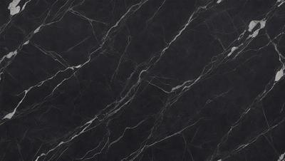 The primary subject of the image is a black marble countertop. The setting is a kitchen, with the countertop being the main focus of the scene. The visual style is a close-up of the marble countertop, showcasing its texture and pattern. The colors and mood of the image are predominantly dark, with the black marble countertop being the main source of contrast.
