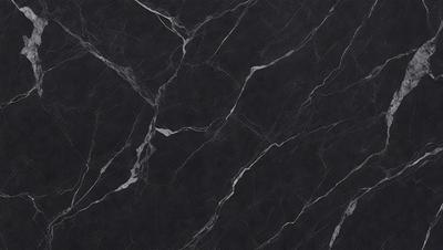The primary subject of the image is a black marble countertop. The setting is a kitchen, with the countertop being the main focus of the scene. The visual style is a close-up of the marble countertop, showcasing its texture and pattern. The colors and mood of the image are predominantly dark, with the black marble countertop being the main source of contrast.
