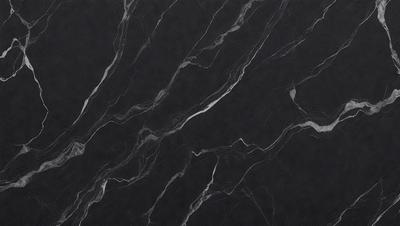 The primary subject of the image is a marble countertop. The setting is a kitchen, with the countertop being the main focus of the scene. The visual style is a close-up of the marble countertop, showcasing its texture and pattern. The colors and mood of the image are predominantly black, giving it a sleek and modern appearance.