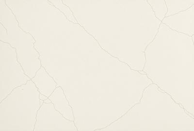 The image features a white wall with a pattern of cracks and crevices. The wall appears to be made of cement or a similar material, giving it a textured and rough appearance. The primary subject of the image is the wall, which serves as the main focus of the scene. The setting is indoors, likely in a room or an outdoor space with a similar texture. The visual style of the image is a close-up of the wall, emphasizing its unique texture and pattern. The colors and mood of