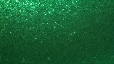 The primary subject of the image is a green background with a pattern of bright green stars. The setting appears to be a space or an artistic environment. The visual style is a combination of a photo and digital art, creating a unique and captivating scene. The dominant colors are green, and the overall atmosphere is vibrant and lively.