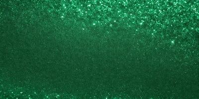 The primary subject of the image is a green background with a pattern of bright green stars. The setting appears to be a dark room, and the visual style is a close-up of the green background. The colors and mood of the image are predominantly green, creating a calm and serene atmosphere.