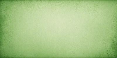 The primary subject of the image is a green wall. The setting is a plain, green wall with no visible background. The visual style is a photo, and the colors and mood are predominantly green, giving the image a calm and serene atmosphere.