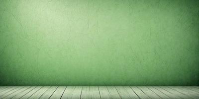 The primary subject of the image is a green wall with a wooden floor. The setting is a room with a green wall, and the visual style is a photo. The dominant colors are green and brown, creating a calm and natural atmosphere.