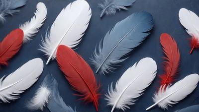 The primary subject of the image is a collection of various feathers, including red, white, and blue ones. These feathers are arranged on a blue surface, creating a visually appealing and colorful display. The setting appears to be a studio or a workspace, where the artist has carefully arranged the feathers to create an artistic composition. The visual style of the image is a mix of photo and digital art, as it captures the intricate details of the feathers while maintaining a sense of creativity and artistic