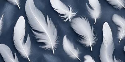 The primary subject of the image is a collection of white feathers, which are arranged in a visually appealing manner. The feathers are spread across a blue surface, creating a striking contrast between the white feathers and the dark blue background. The visual style of the image is a combination of photo and digital art, as the feathers appear to be realistic yet have a slightly manipulated appearance. The overall atmosphere of the image is serene and calming, with the white feathers symbolizing purity and innocence.
