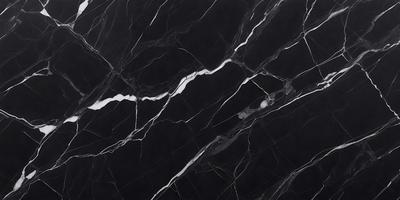 The primary subject of the image is a marble countertop with a black background. The countertop features a white marble pattern, giving it a luxurious and elegant appearance. The visual style of the image is a close-up of the marble countertop, showcasing its intricate details and texture. The colors and mood of the image are predominantly black and white, creating a sophisticated and timeless atmosphere.