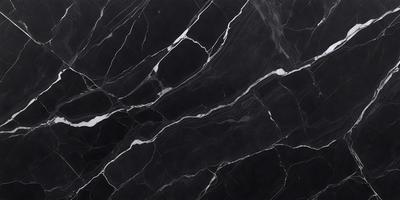 The image features a black marble countertop with a pattern of white dots. The countertop appears to be a part of a kitchen or bathroom setting. The visual style of the image is a close-up of the marble countertop, showcasing its unique texture and design. The overall atmosphere of the image is elegant and sophisticated, with the black marble countertop serving as a striking focal point.