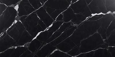 The primary subject of the image is a black marble countertop. The setting is a kitchen, with the countertop being the main focus of the scene. The visual style is a close-up of the marble countertop, showcasing its texture and pattern. The colors and mood of the image are predominantly black, giving it a sleek and modern appearance.