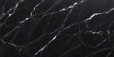 The primary subject of the image is a marble countertop with a black and white pattern. The setting is a kitchen, and the visual style is a close-up of the marble countertop. The colors and mood of the image are predominantly black and white, giving it a classic and elegant appearance.