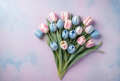 The primary subject of the image is a bouquet of tulips, which are the main objects in the scene. The bouquet is displayed on a purple surface, which serves as the background. The visual style of the image is a close-up of the tulips, showcasing their vibrant colors and details. The dominant colors in the image are purple and various shades of pink and blue, creating a warm and inviting atmosphere.