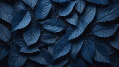 The primary subject of the image is a large group of blue leaves, which are the main objects in the scene. The leaves are arranged in a pattern, creating a visually appealing and cohesive design. The setting is a blue background, which complements the blue leaves and adds to the overall atmosphere of the image. The visual style of the image is a close-up of the leaves, showcasing their intricate details and textures. The colors and mood of the image are predominantly blue, creating a serene