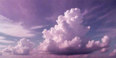 The primary subject of the image is a large, fluffy cloud in the sky. The cloud is pink and white, and it appears to be a part of a purple sky. The setting is a cloudy day, and the visual style is a natural, outdoor scene. The colors and mood of the image are serene and calming, with the pink and white cloud contrasting against the purple sky.