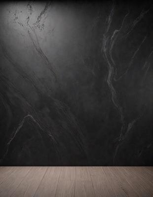 The primary subject of the image is a black marble wall with a pattern of swirls and curves. The setting is a room with a black marble wall as the main focus. The visual style is a close-up of the marble wall, showcasing its intricate design. The colors and mood of the image are dark and dramatic, with the black marble wall serving as the dominant feature.