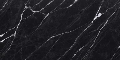 The primary subject of the image is a black marble countertop. The setting is a kitchen, with the countertop being the main focus of the scene. The visual style is a close-up of the marble countertop, showcasing its texture and pattern. The colors and mood of the image are predominantly dark, with the black marble countertop being the main source of contrast.
