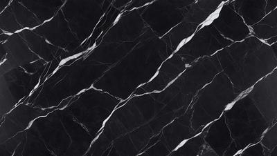 The primary subject of the image is a marble countertop with a black and white pattern. The setting is a kitchen, and the visual style is a close-up of the countertop. The dominant colors are black and white, creating a classic and elegant atmosphere.
