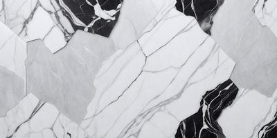 The primary subject of the image is a marble countertop. The setting is a kitchen, with the countertop being the main focus of the scene. The visual style is a close-up of the marble countertop, showcasing its texture and beauty. The colors and mood of the image are predominantly white, giving it a clean and elegant appearance.