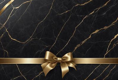 The primary subject of the image is a gold bow tied around a black marble surface. The setting is a black marble countertop, and the visual style is a close-up of the bow. The colors and mood of the image are predominantly black and gold, creating a sophisticated and elegant atmosphere.