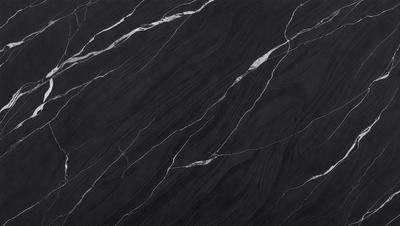 The primary subject of the image is a black marble countertop. The setting is a kitchen, with the countertop being the main focus of the scene. The visual style is a close-up of the marble countertop, showcasing its texture and pattern. The colors and mood of the image are dark and moody, with the black marble countertop being the dominant color.