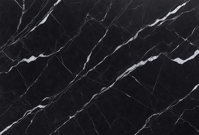 The primary subject of the image is a marble countertop with a black and white pattern. The setting is a kitchen, and the visual style is a close-up of the marble countertop. The colors and mood of the image are predominantly black and white, giving it a classic and elegant appearance.