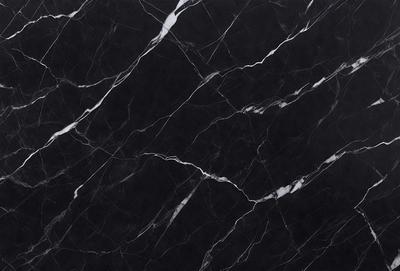 The primary subject of the image is a marble countertop with a black and white pattern. The setting is a kitchen, and the visual style is a close-up of the marble countertop. The colors and mood of the image are predominantly black and white, giving it a classic and elegant appearance.