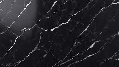 The primary subject of the image is a black marble countertop with a white vein running through it. The setting is a kitchen, and the visual style is a close-up of the marble countertop. The colors and mood of the image are predominantly black and white, giving it a sleek and modern appearance.