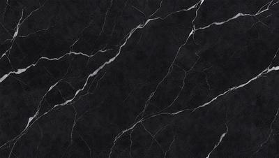 The primary subject of the image is a black marble countertop. The setting is a kitchen, with the countertop being the main focus of the scene. The visual style is a close-up of the marble countertop, showcasing its texture and pattern. The colors and mood of the image are predominantly dark, with the black marble countertop being the main source of contrast.