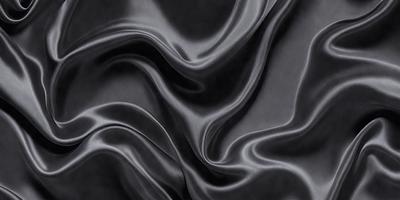 The primary subject of the image is a black fabric with a pattern of swirls and waves. The setting is a black background, which contrasts with the fabric. The visual style is a close-up of the fabric, showcasing its intricate pattern. The colors and mood of the image are predominantly dark and moody, with the black fabric and swirls creating a dramatic and striking appearance.