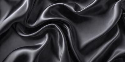The primary subject of the image is a close-up of a black fabric, possibly a piece of clothing or a curtain. The setting is a dark room, and the visual style appears to be a photo. The colors and mood of the image are predominantly dark and moody, with the black fabric being the main focus.