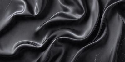 The primary subject of the image is a close-up of a black fabric, possibly a piece of clothing or a curtain. The setting is a dark background, which emphasizes the fabric's texture and pattern. The visual style appears to be a photo, as it captures the details of the fabric. The colors and mood of the image are predominantly dark, with the black fabric being the main focus.