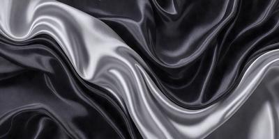 The primary subject of the image is a close-up of a black and silver fabric. The setting is a black background, which contrasts with the fabric. The visual style is a combination of a photo and digital art, creating a unique and intriguing pattern. The dominant colors are black and silver, giving the image a sleek and modern appearance.