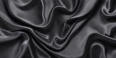 The primary subject of the image is a close-up of a black fabric, possibly a piece of clothing or a curtain. The setting is a dark room, and the visual style appears to be a photo. The colors and mood of the image are predominantly dark and moody, with the black fabric being the main focus.