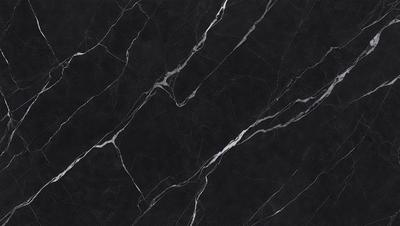 The primary subject of the image is a close-up of a marble countertop. The setting is a kitchen, with the marble countertop being the main focus of the scene. The visual style is a photo, showcasing the natural texture and patterns of the marble. The colors and mood of the image are predominantly black and white, giving it a classic and elegant appearance.