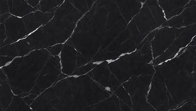 The primary subject of the image is a black marble countertop. The setting is a kitchen, with the countertop being the main focus of the scene. The visual style is a close-up of the marble countertop, showcasing its texture and pattern. The colors and mood of the image are predominantly dark, with the black marble countertop being the main source of contrast.
