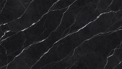 The primary subject of the image is a black marble countertop. The setting is a kitchen, with the countertop being the main focus of the scene. The visual style is a close-up of the marble countertop, showcasing its texture and pattern. The colors and mood of the image are predominantly dark, with the black marble countertop being the main source of contrast.