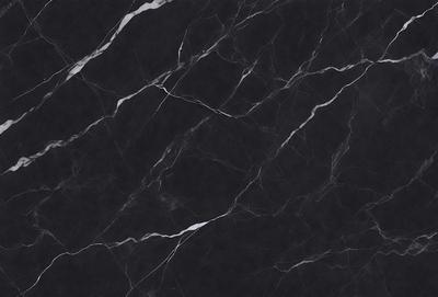 The primary subject of the image is a black marble countertop. The setting is a kitchen, with the countertop being the main focus of the scene. The visual style is a close-up of the marble countertop, showcasing its texture and pattern. The colors and mood of the image are dark and moody, with the black marble countertop being the dominant color.