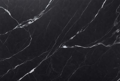 The primary subject of the image is a marble countertop with a black and white pattern. The setting is a kitchen, and the visual style is a close-up of the countertop. The colors and mood of the image are predominantly black and white, giving it a classic and elegant appearance.