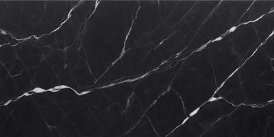 The primary subject of the image is a black marble countertop. The setting is a kitchen, with the countertop being the main focus of the scene. The visual style is a close-up of the marble countertop, showcasing its texture and pattern. The colors and mood of the image are predominantly dark, with the black marble countertop being the main source of contrast.