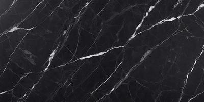 The primary subject of the image is a marble countertop with a black and white pattern. The setting is a kitchen, and the visual style is a close-up of the countertop. The colors and mood of the image are predominantly black and white, giving it a classic and elegant appearance.