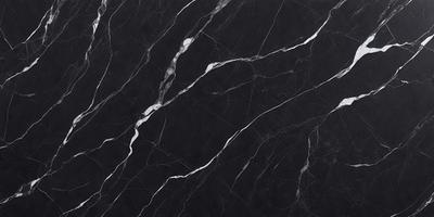 The primary subject of the image is a black marble countertop with white veins. The setting is a kitchen, and the visual style is a close-up of the marble countertop. The dominant colors are black and white, creating a sleek and modern atmosphere.