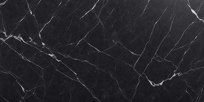 The primary subject of the image is a black marble countertop. The setting is a kitchen, with the countertop being the main focus of the scene. The visual style is a close-up of the marble countertop, showcasing its texture and pattern. The colors and mood of the image are predominantly black, giving it a sleek and modern appearance.