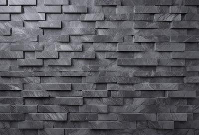The primary subject of the image is a large, gray brick wall. The setting is a black and white photo, which gives the image a classic and timeless appearance. The visual style is a close-up of the brick wall, showcasing its texture and pattern. The colors and mood of the image are predominantly black and white, creating a sense of depth and contrast.