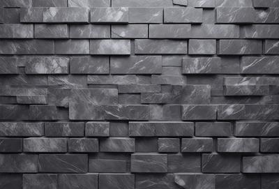 The primary subject of the image is a large, black stone wall. The setting is a dark room, and the visual style is a close-up of the stone wall. The colors and mood of the image are dark and moody, with the black stone wall as the main focal point.