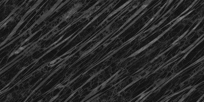 The primary subject of the image is a black and white marble pattern. The setting is a black background, and the visual style is a patterned texture. The colors and mood of the image are predominantly black and white, creating a classic and elegant atmosphere.